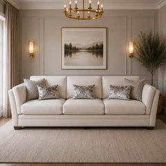 beige corner sofa with a compact l shape, soft cushions and a smooth fabric finish — close view showing the cushion and su...