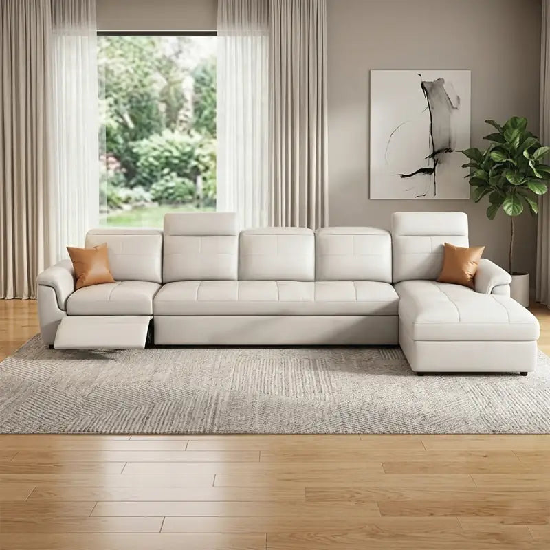 Convertible sofa bed with adjustable headrests, with practical features for compact living spaces
