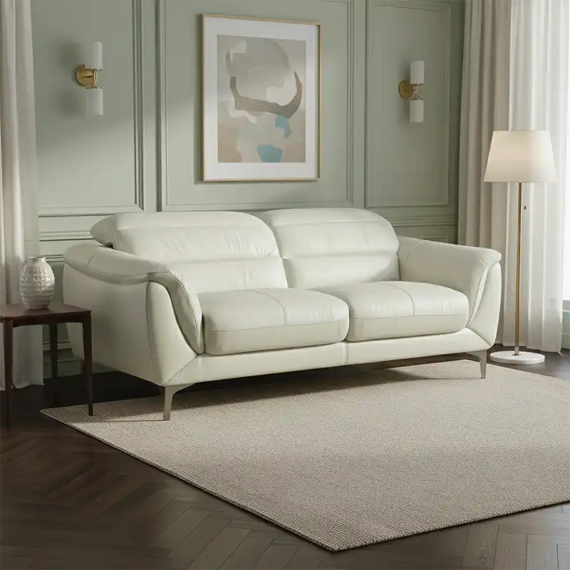 modern l shape sofa with high back cushions, soft rounded arms and slim raised legs — close view showing the cushion and s...