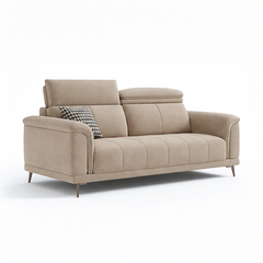 beige l shape sofa with adjustable head support, rounded arms and slim raised legs — close view showing the cushion and su...