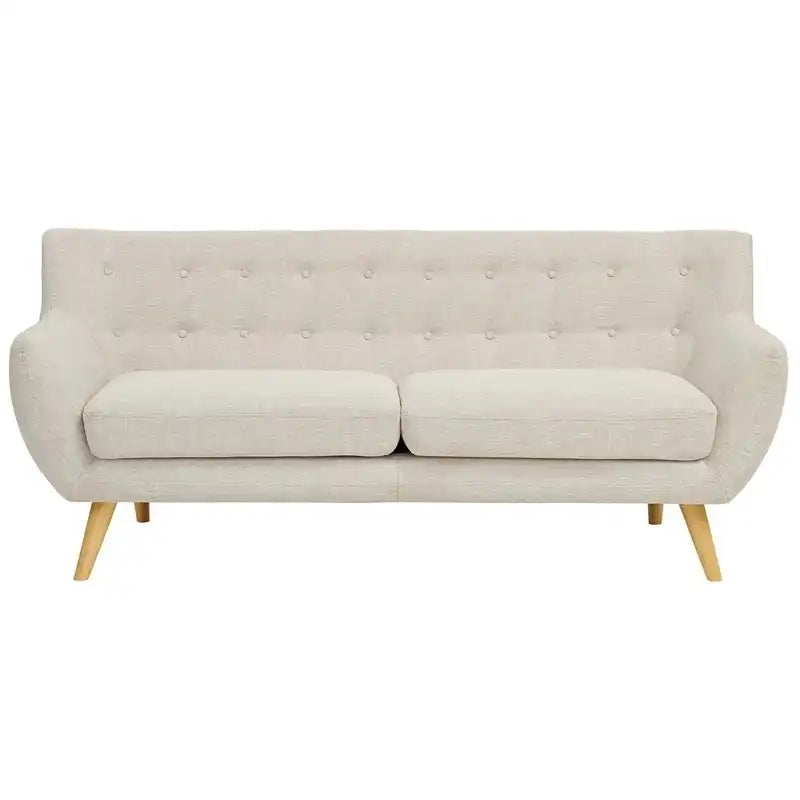 soft beige fabric sofa with rounded arms, buttoned back cushions and slim wooden legs — close view showing the cushion and...