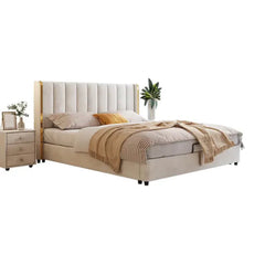Contemporary bed frame cot design with gold trim and soft cream fabric finish