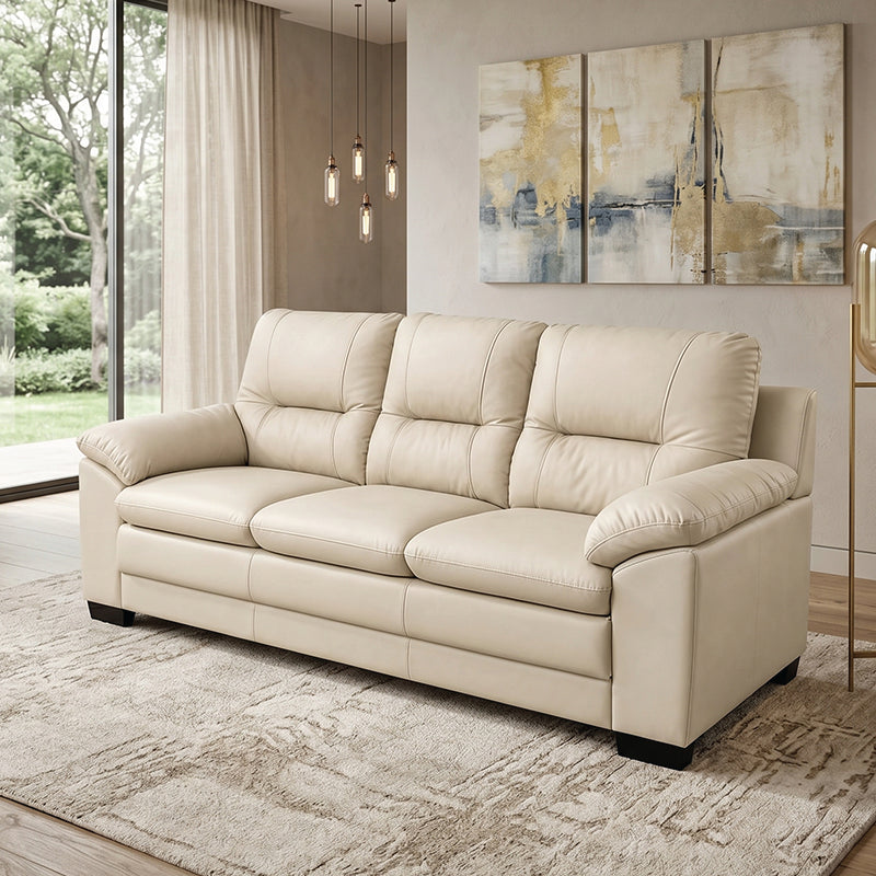 coordinated sofa set with soft cushions, broad pillow style arms and an easy clean finish — side angle showing the arms an...