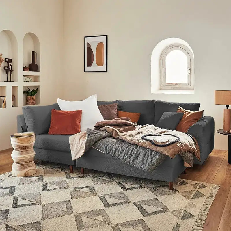 Sleeper sofa with a movable footstool, with supportive cushions for everyday comfort