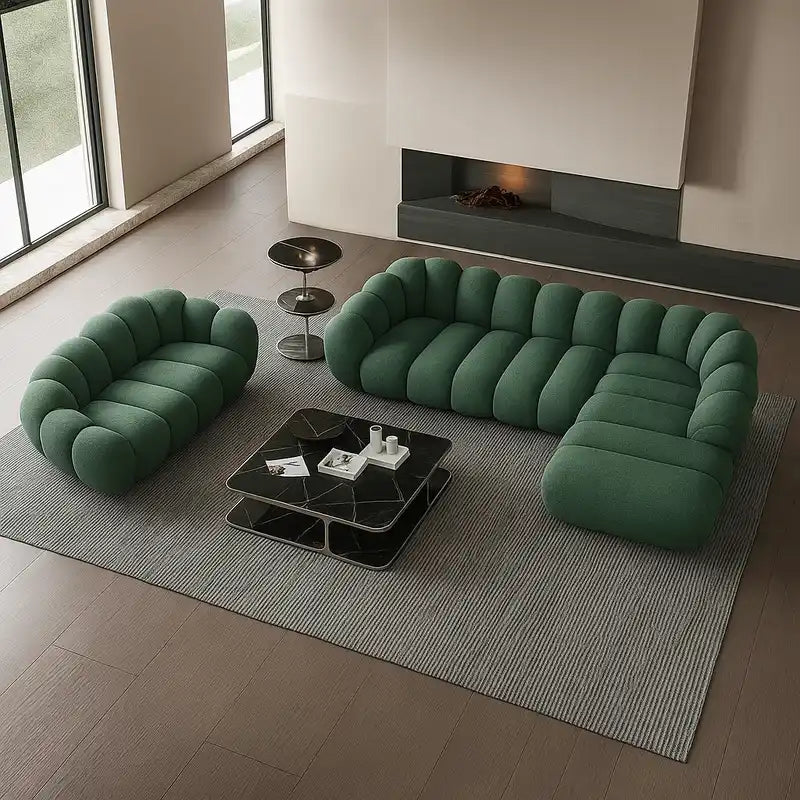 soft curved sofa with rounded cushion sections, a cloud like shape and a low relaxed base — wide room view showing the com...
