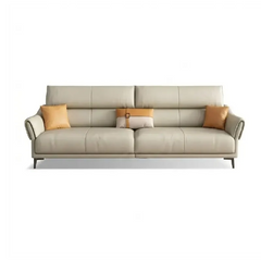 beige leatherette sofa with supportive high back cushions, rounded arms and slim raised legs — wide room view showing the...
