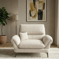 cream textured fabric sofa with curved arms, supportive back cushions and slim dark legs — front angle showing the back su...