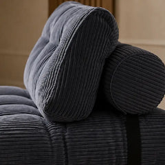 Folding sofa bed in soft ribbed fabric, designed for relaxed seating and guest use