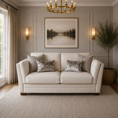 beige corner sofa with a compact l shape, soft cushions and a smooth fabric finish — front angle showing the back support...