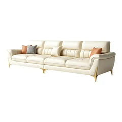 cream high back sofa with vertical cushion panels, rounded arms and slim gold finish legs — front angle showing the back s...