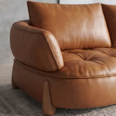 Close-up detail view of Omero living room sofa highlighting leather sofa set quality, luxury sofa set craftsmanship, designer couch detailing, tufted cushions and modern sofa construction