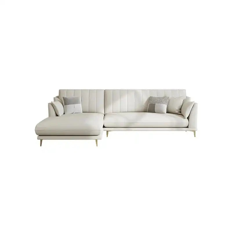 soft cream corner sofa with deep cushions, vertical back details and slim gold finish legs — front angle showing the back...