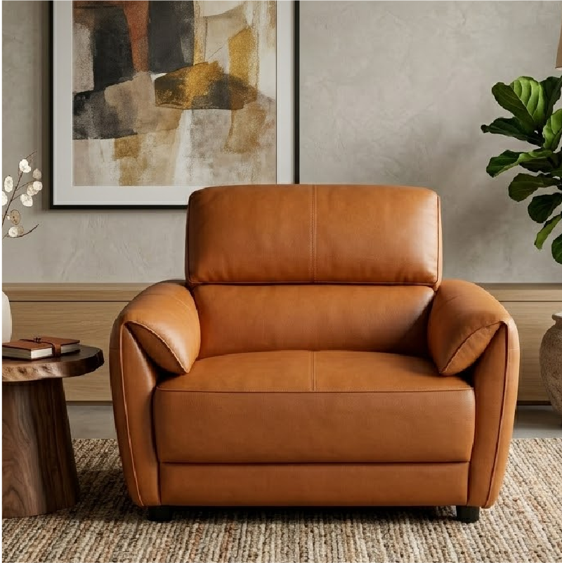 tan l shape sofa with deep cushions, supportive back panels and wide padded arms — wide room view showing the complete sea...