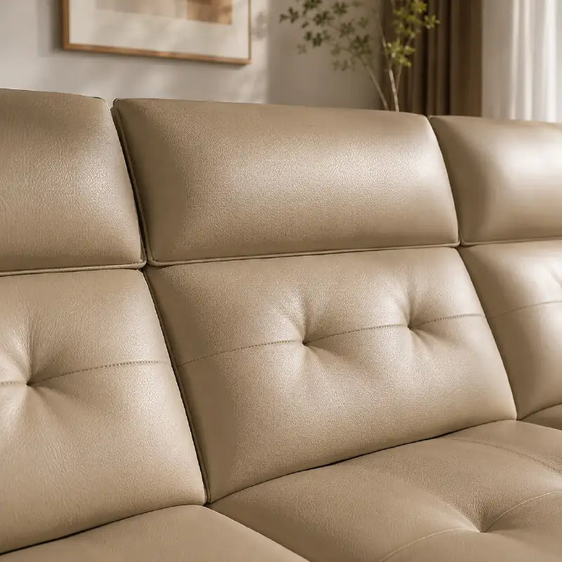 Faux leather convertible sofa bed, with a clean profile and custom finish options