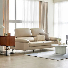 modern sofa with soft curved arms, supportive back cushions and raised chrome finish legs — alternate angle showing the fu...