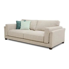 modern neutral fabric sofa with wide padded arms, thick cushions and clean straight lines — alternate angle showing the fu...