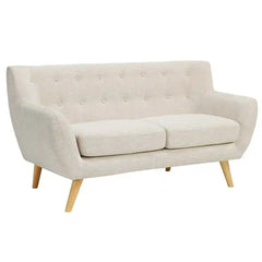 soft beige fabric sofa with rounded arms, buttoned back cushions and slim wooden legs — alternate angle showing the full d...