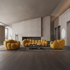 soft curved sofa with rounded cushion sections, a cloud like shape and a low relaxed base — full view with the complete sh...