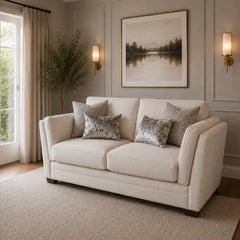 beige corner sofa with a compact l shape, soft cushions and a smooth fabric finish — full view with the complete shape cle...