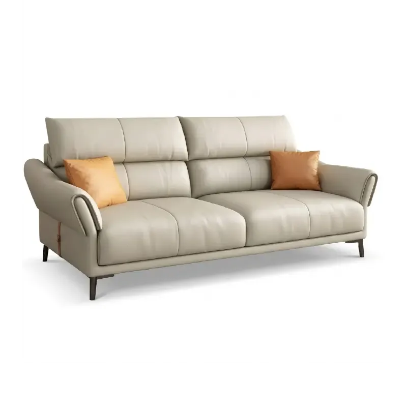 beige leatherette sofa with supportive high back cushions, rounded arms and slim raised legs — full view with the complete...