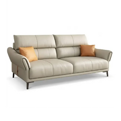 beige leatherette sofa with supportive high back cushions, rounded arms and slim raised legs — full view with the complete...