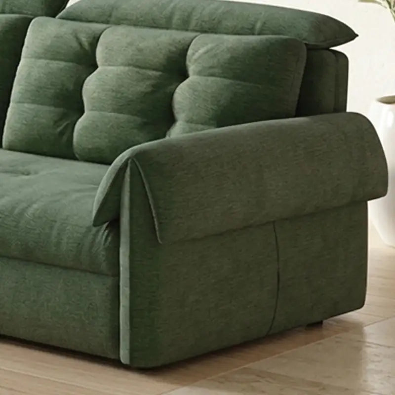 Couch with pull-out bed and soft cushions, with easy conversion from seating to sleeping