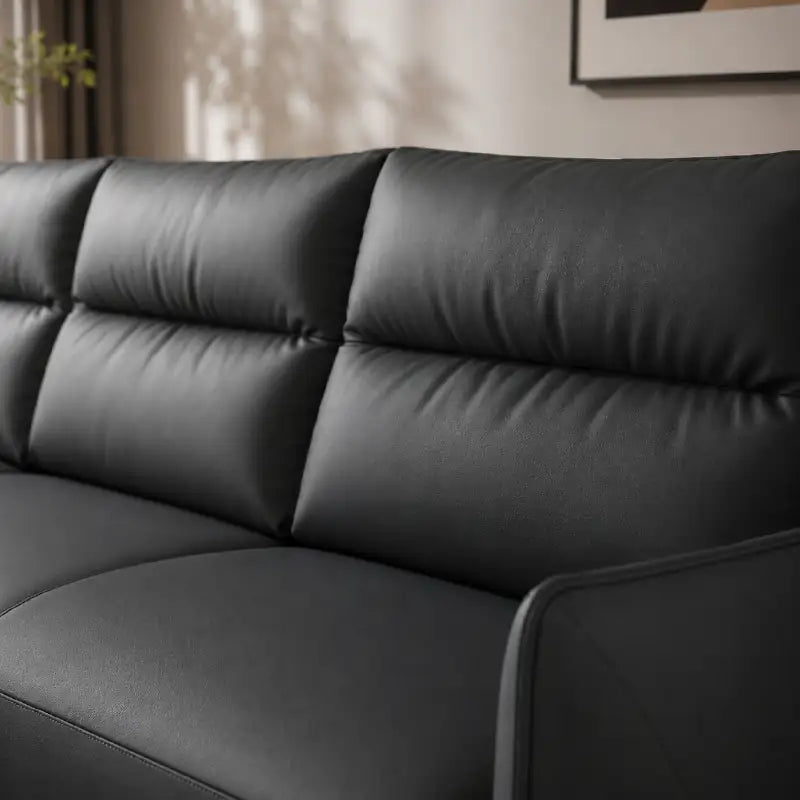 Faux leather sofa bed with hidden storage, with easy conversion from seating to sleeping