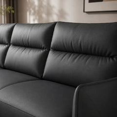Faux leather sofa bed with hidden storage, with easy conversion from seating to sleeping