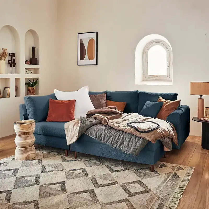 Sleeper sofa with a movable footstool, with easy conversion from seating to sleeping